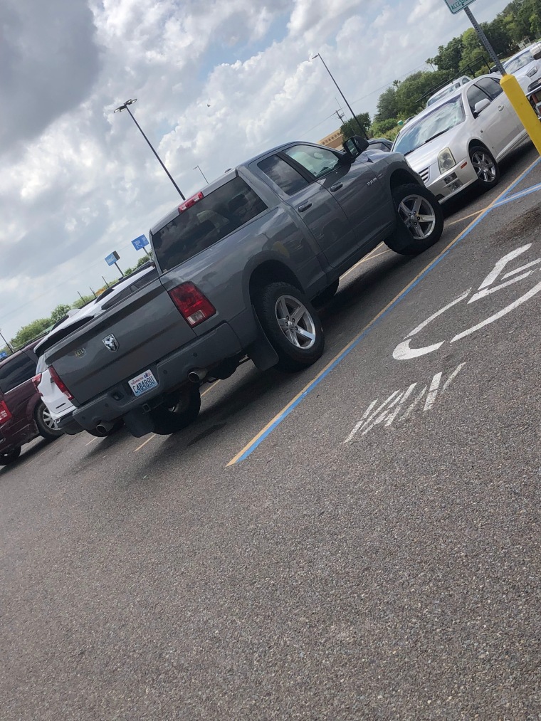Jim's Dodge Ram in the Walmart parking lot.