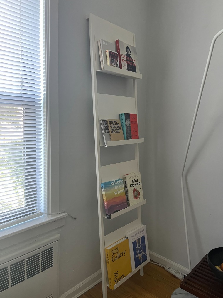 Associate editor Justin Krajeski loves the design of his Pottery Barn Temple Street Display for showing off coffee table books.