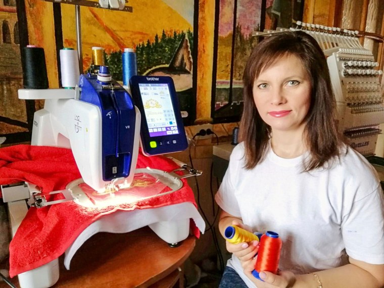 Refugee Elena Kuleshova left her embroidery machine in Ukraine when she fled to Poland in March. Community members and friends helped her buy a new one so she could start her business again.
