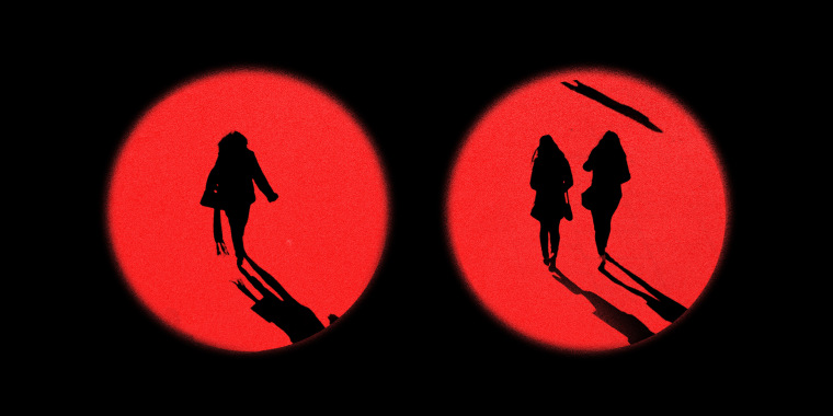 Photo illustration: Two red circles showing women walking in the distance.