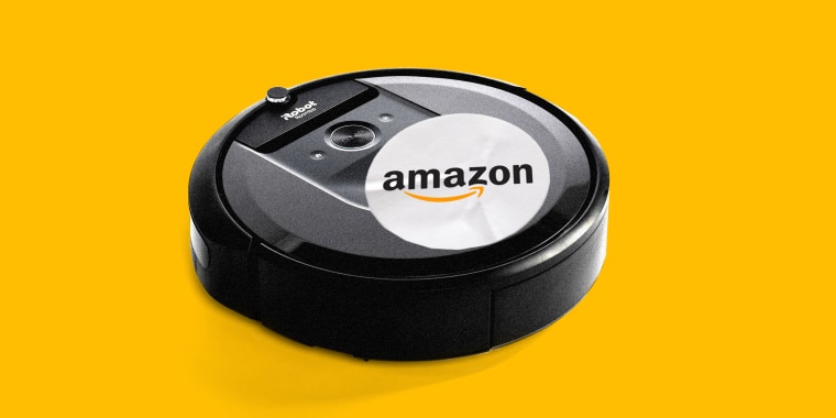 Photo illustration: A Roomba with a sticker with an Amazon logo on it.