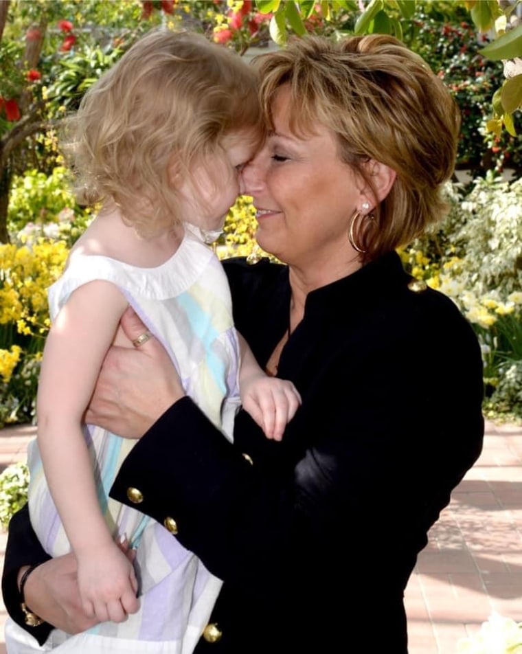 Dee Ann Warner holding her daughter, Angelina.