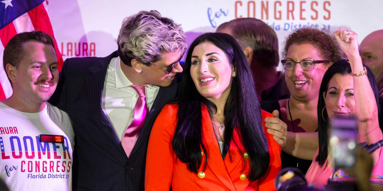Republican congressional candidate Laura Loomer celebrates with Milo Yiannopoulos (left) and campaign director Karen Giorno (right) at an election night event at the airport Hilton in West Palm Beach on Aug. 18, 2020.[ALLEN EYESTONE/palmbeachpost.com]