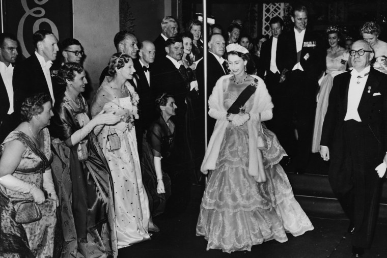 Queen Elizabeth II and the Duke of Edinburgh leave City Hall following a Civic Ball circa 1954.