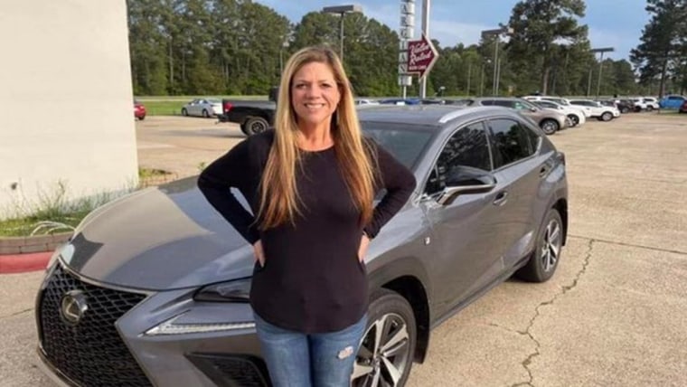 Michelle and her gray Lexus NX 300.