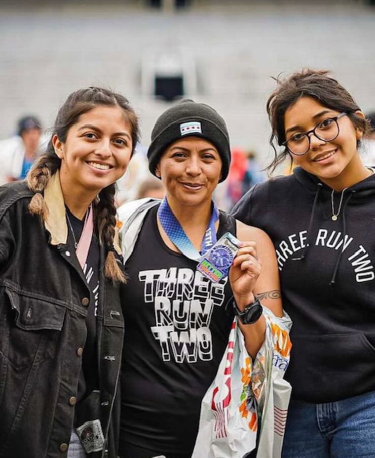 Erika Aleman with her daughters Marcia, 21, and Abby, 16, after completing the Chicago Marathon on Sunday.