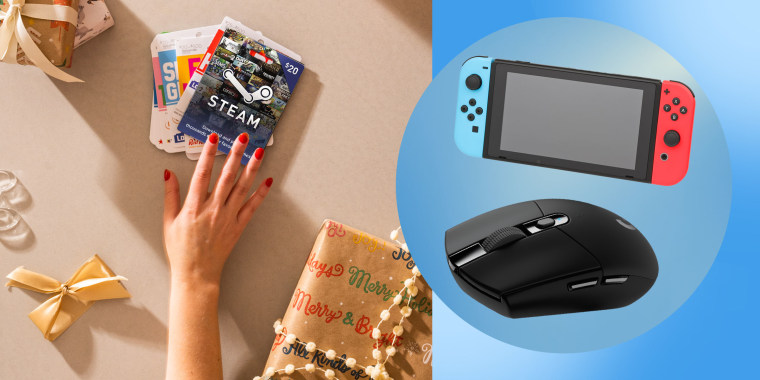 Hand on gift cards, a Nintendo and a mouse