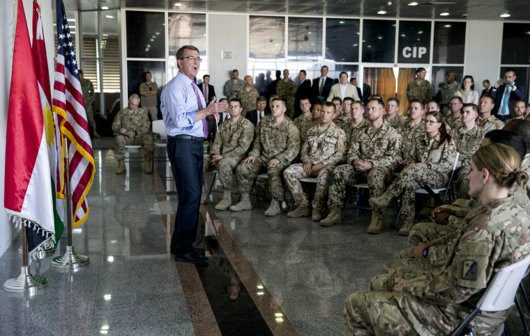 Defense Secretary Ash Carter talks to multinational troops at the Irbil International Airport on July 24, 2015, in Irbil, Iraq.