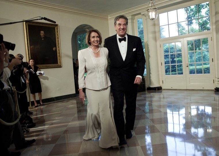 Image: Speaker of the House Nancy Pelosi and her husband, Paul, arrive at the White House in 2010.