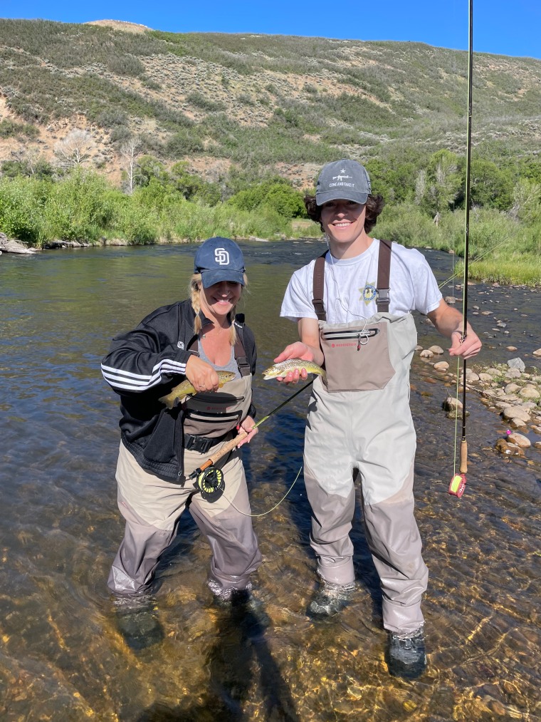 Miles and Laura fishing.