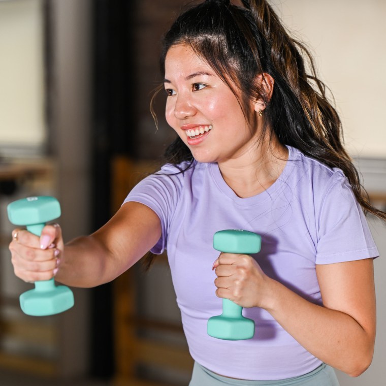 Woman holding weights