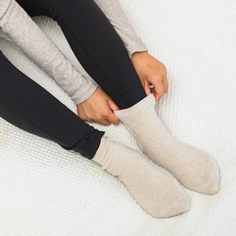 No matter what, you should purchase the highest-quality socks you can afford, recommends podiatrist Dr. Ashley Lee. "A high-quality sock ... will ‘hug' your arches, giving you support," she says.