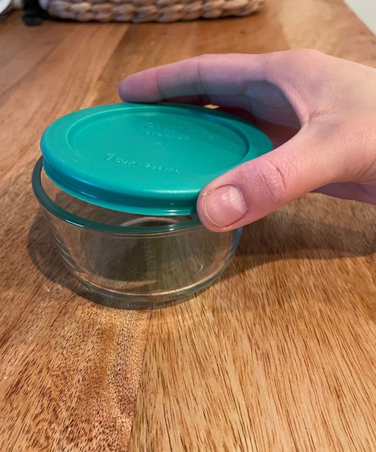 Pictured: The round 1-cup food storage container from Pyrex's Simply Store set. The collection comes with both round and rectangular containers, all with corresponding lids that are marked with each container's capacity (in cups and milliliters). 