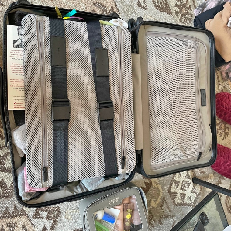 I was skeptical at how well Monos' Pro Carry-On would compete with its less costly competitors, but after packing about five days' worth of clothing (and gifts!) in the Calpak Hue, and then transferring it to the Pro (pictured), I was taken aback at how much better the latter packs everything in — while still having room in front for a 15-inch laptop.