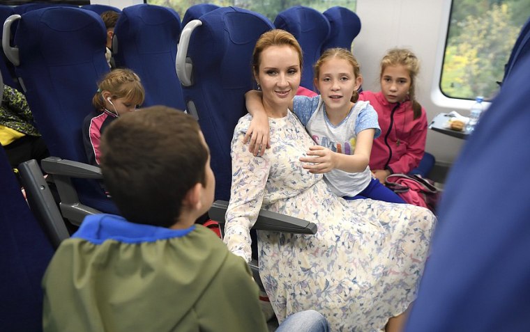 Russian Presidential Commissioner for Children's Rights, Maria Lvova-Belova, transporting orphans from the Donetsk People's Republic in Sept. 2022.