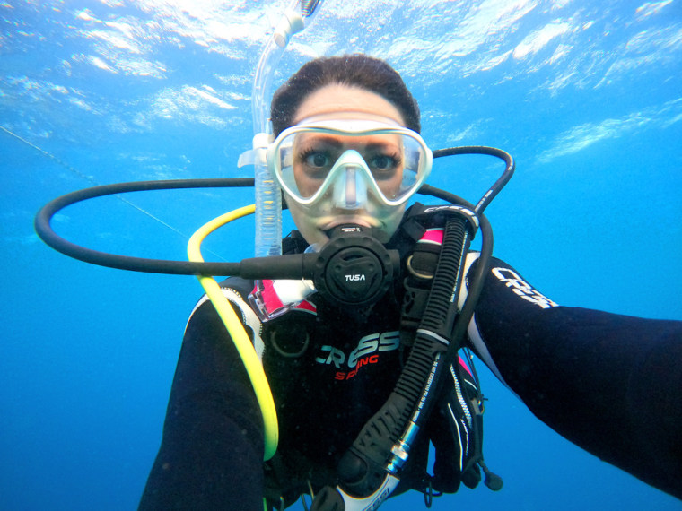 Andi Cross is an expedition lead, growth strategist, divemaster, founder of impact consultancy WILDPALM.