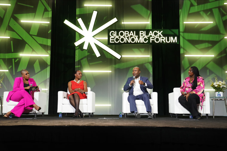 MSNBC's Symone Sanders Townsend, left, moderates a panel on voting and policy shifts in the development of Black wealth and power with CBCF president and CEO Nicole Austin-Hillery, DNC Chair Jaime Harrison, and Fair Count president Dr. Jeanine Abrams McLean at the 2023 Essence Festival.