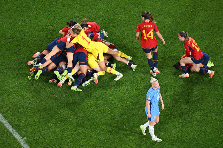 Spain celebrates winning its first Women's World Cup title ever, piling on top of each other after the final whistle sounded. Spain claimed victory over England with a 1-0 final score.