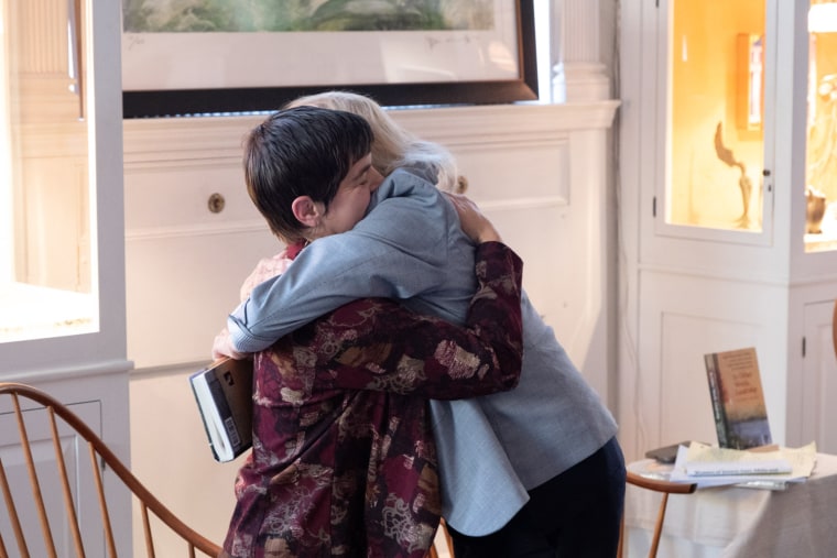 Ashirah Knapp, left, hugs Maine Gov. Janet Mills, who became her pen pal in 2020.