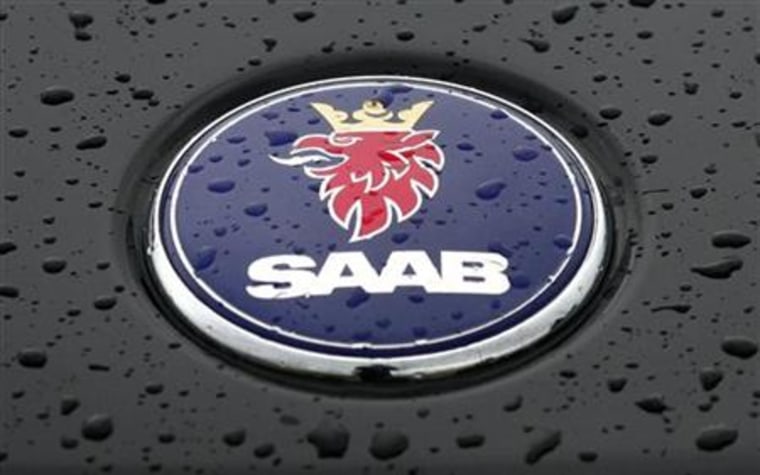 The Saab corporate logo is seen on the hood of a Saab automobile in Trollhattan