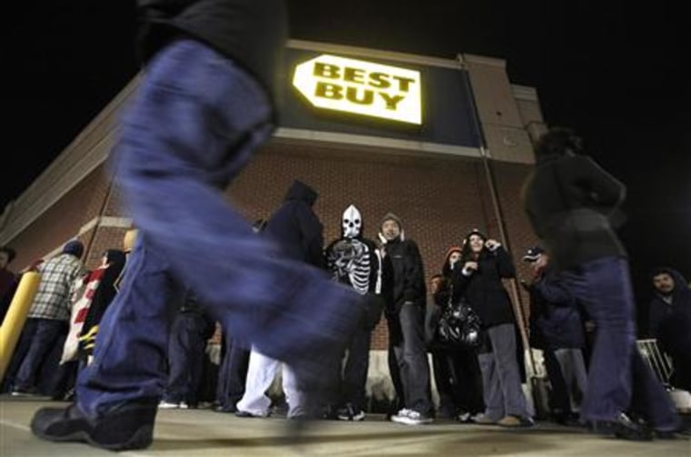 Black Friday sales shoppers line up outside a Best Buy electronics store in Falls Church