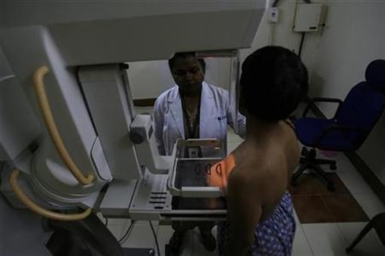 Woman undergoes a mammography examination in a hospital on the outskirts of Siliguri