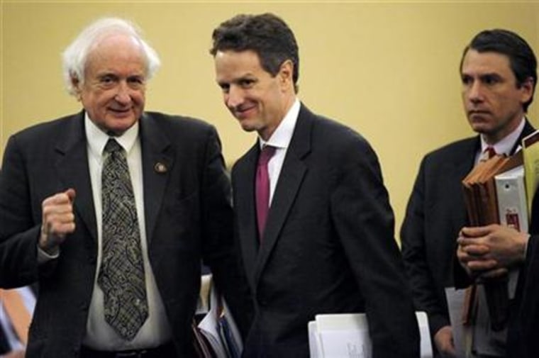 Geithner talks with Levin as he arrives to testify before the House Ways and Means Committee on Capitol Hill in Washington