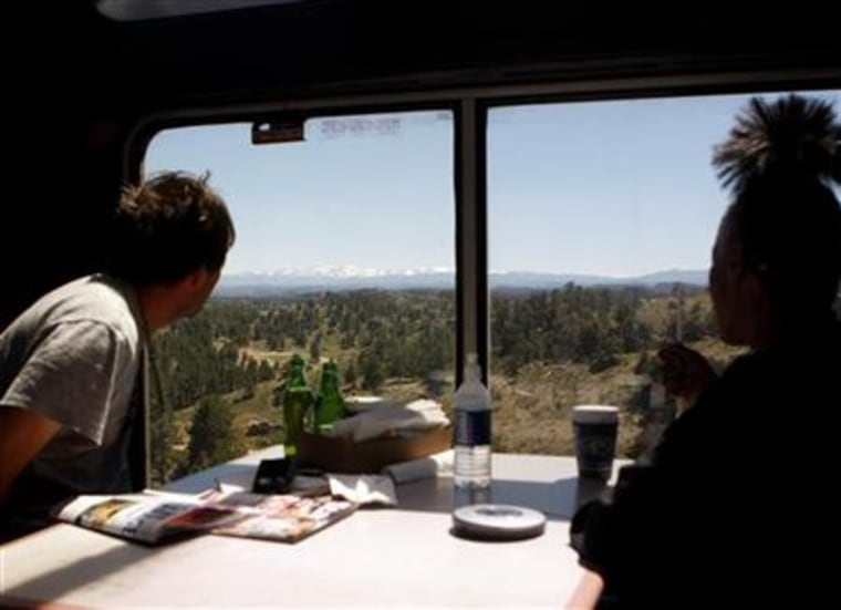 Passengers ride the 5 California Zephyr Amtrak train in Nevada