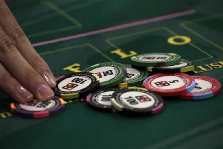 Casino chips are displayed during the Global Gaming Expo Asia in Macau
