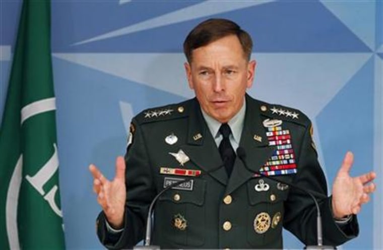 U.S. General Petraeus and NATO Secretary General Rasmussen address a joint news conference in Brussels