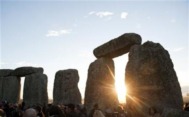 People attend the annual summer solstice at the Stonehenge monument