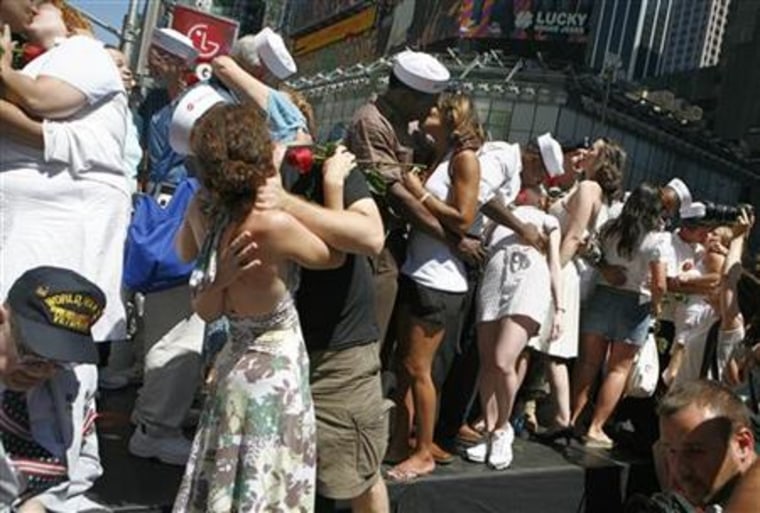 Couples participate in a \"Kiss-In\" in New York's Times Square