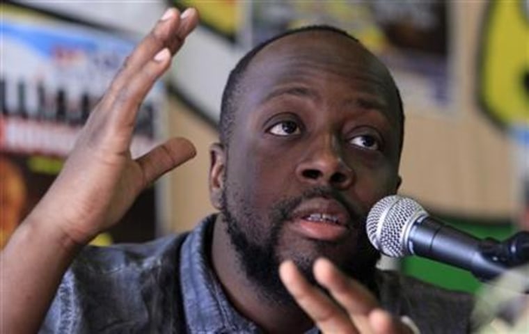 Haitian singer Wyclef Jean attends a news conference in Hoogstraten