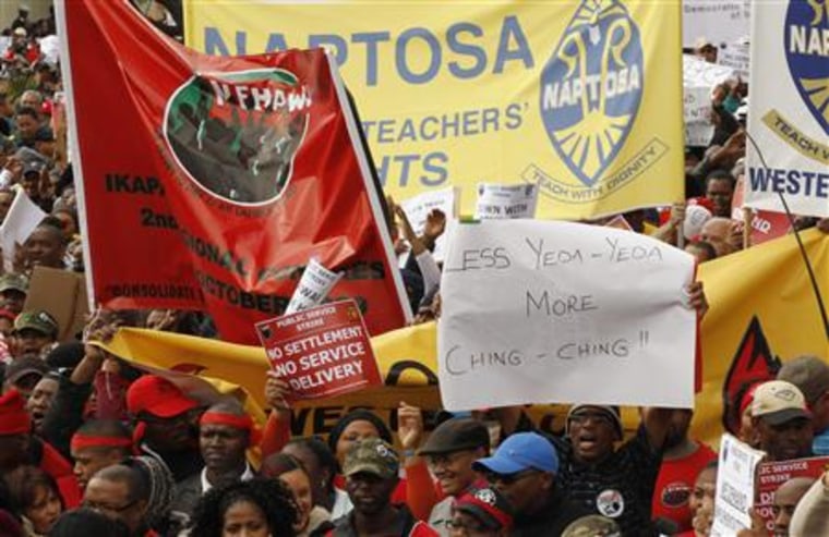 Striking South African public service workers march through the streets of Cape Town