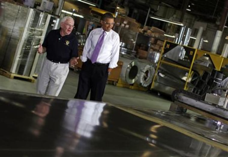 President Barack Obama tours Stromberg Metal Works with CEO Robert Gawne in Beltsville, Maryland