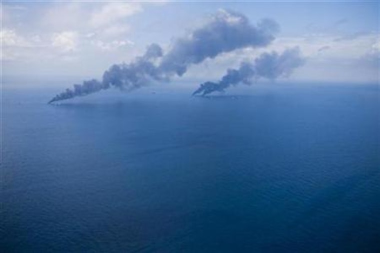 Oil is burned off the surface of the water near the source of Deepwater Horizon oil spill in the Gulf of Mexico