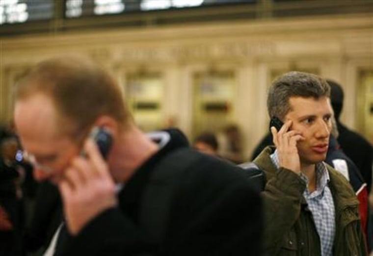 A man talks on his cell phone inside Grand Central Station in New York in this March 4, 2008 file photo.