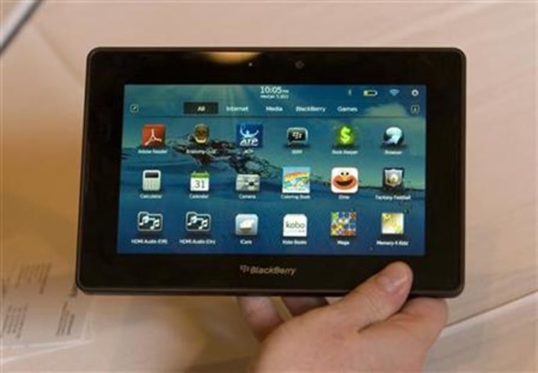 Jeff McDowell holds a prototype Blackberry PlayBook during an interview in Las Vegas