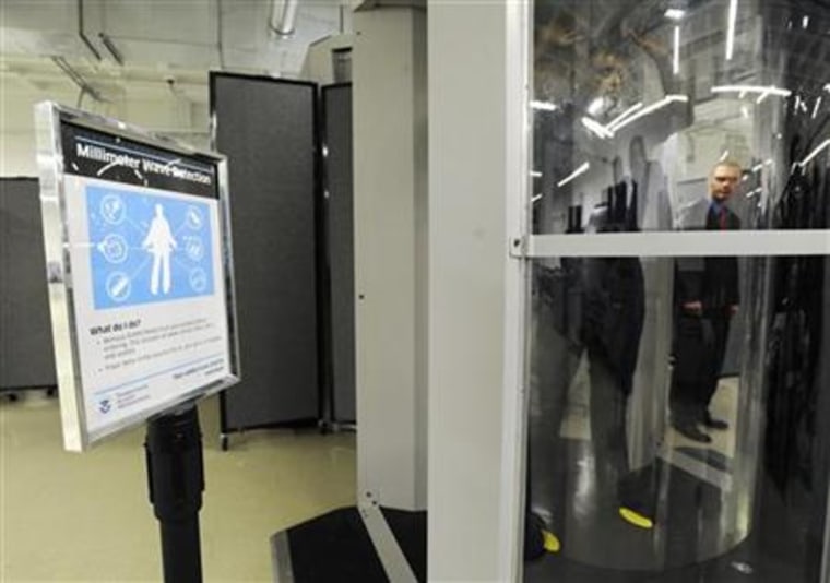 Transportation Security Administration employees participate in a demonstration of new body scanner software in Arlington