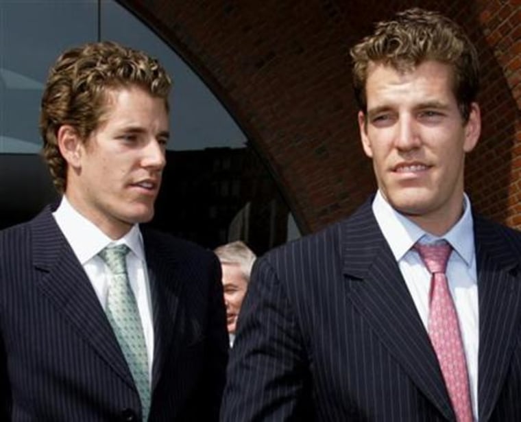 Cameron and Tyler Winklevoss, co-founders of ConnectU Inc., leave the U.S. District Court in Boston