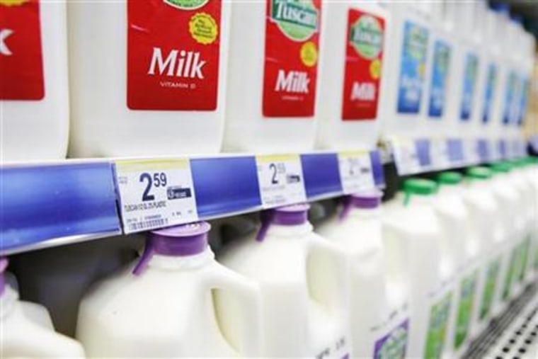 Price labels of milk are seen on a store shelf in New York