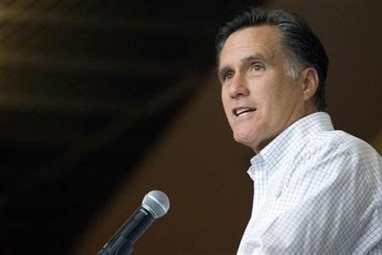 Former Massachusetts Governor and likely Republican presidential candidate Romney answers questions from reporters in Las Vegas