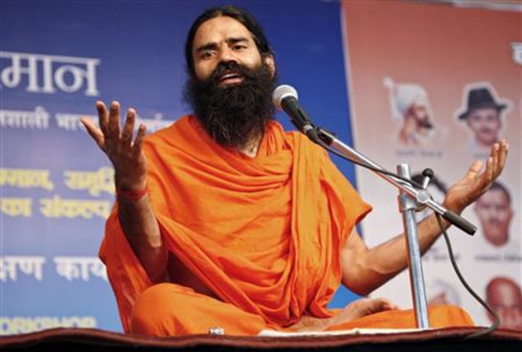 File photo of India's yoga guru Swami Ramdev speaking during a yoga camp in Haridwar