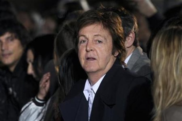 Singer Paul McCartney attends the fashion show designed by his daughter Stella McCartney at her Fall-Winter 2011/2012 women's collection during Paris Fashion Week