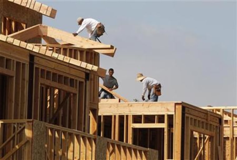 Construction workers are shown on a residential housing work site in Burbank
