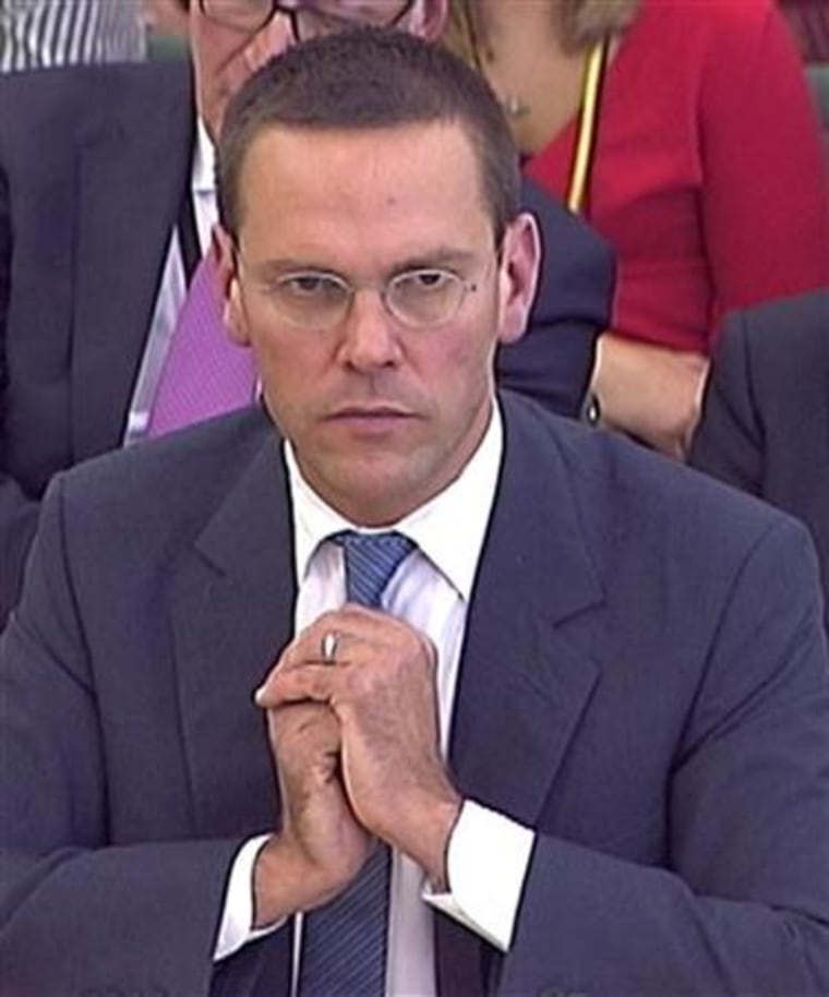 BSkyB Chairman James Murdoch appears before a parliamentary committee on phone hacking at Portcullis House in London