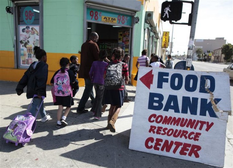 Regional coordinator Charles Evans picks up children from school to take them to an after-school program at South Los Angeles Learning Center in Los Angeles