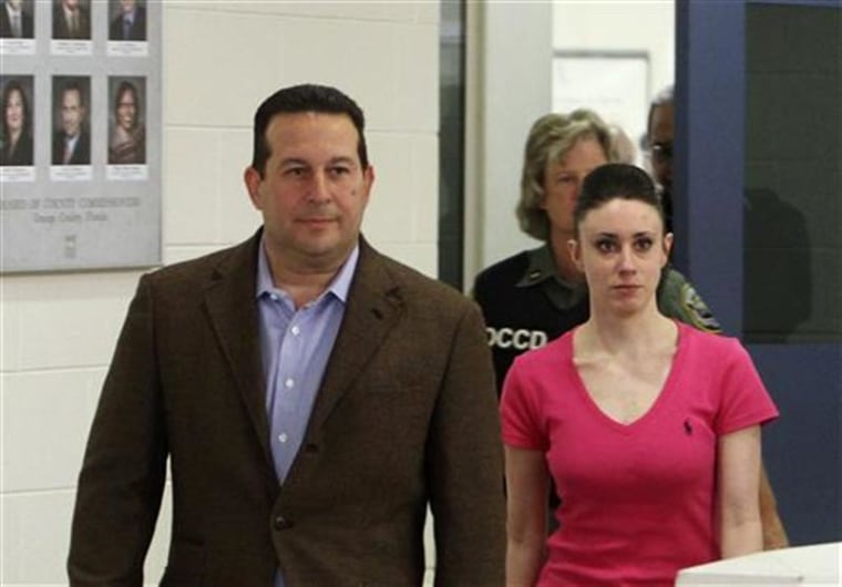 Casey Anthony and her lawyer Jose Baez leave the Orange County Jail in Orlando