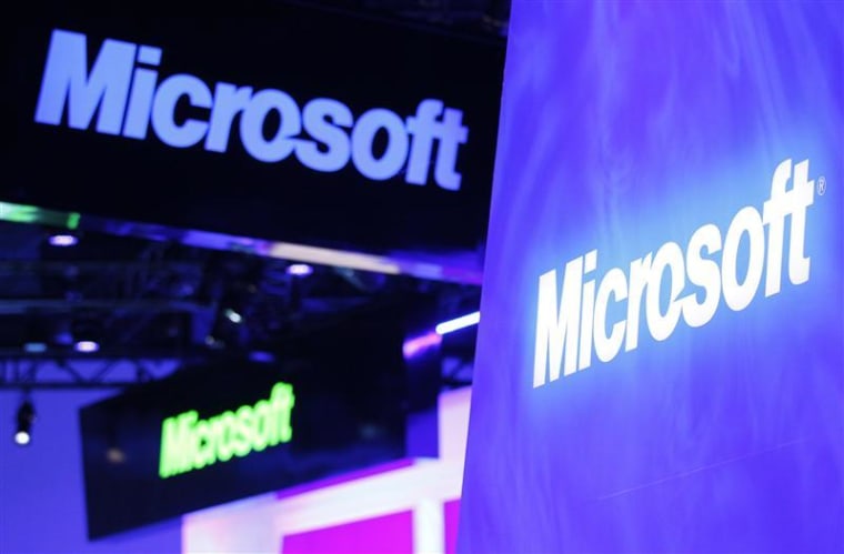 A variety of logos hover above the Microsoft booth on the opening day of the Consumer Electronics Show in Las Vegas