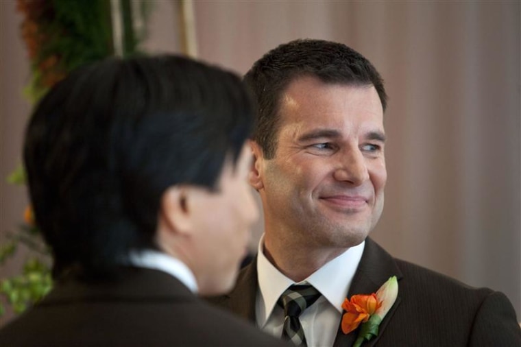 Shawn Klein smiles during his marriage ceremony to his life-partner Phil Fung in New York